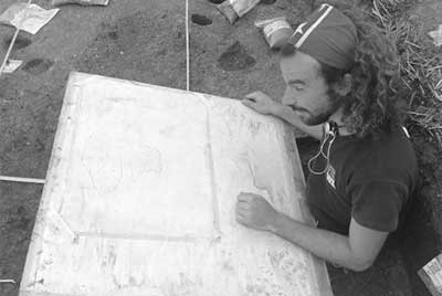 Archaeologist drawing a section